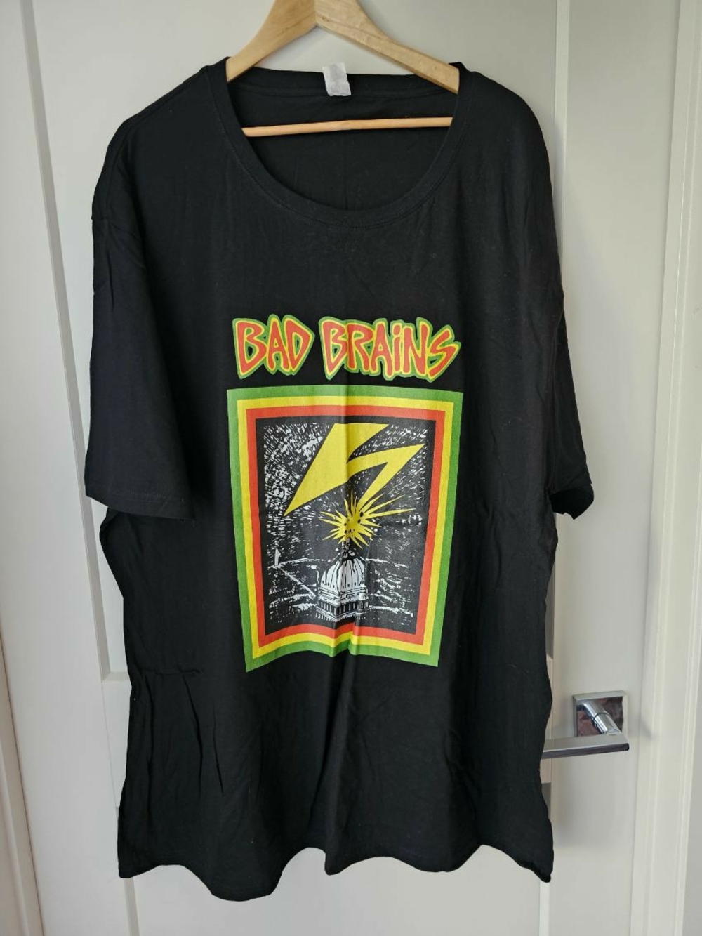 Bad Brains-Bad Brains Black Graphic Tee with Yellow & Green Logo